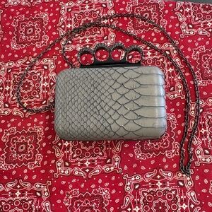 Gray Textured Clutch Bag with Knuckles